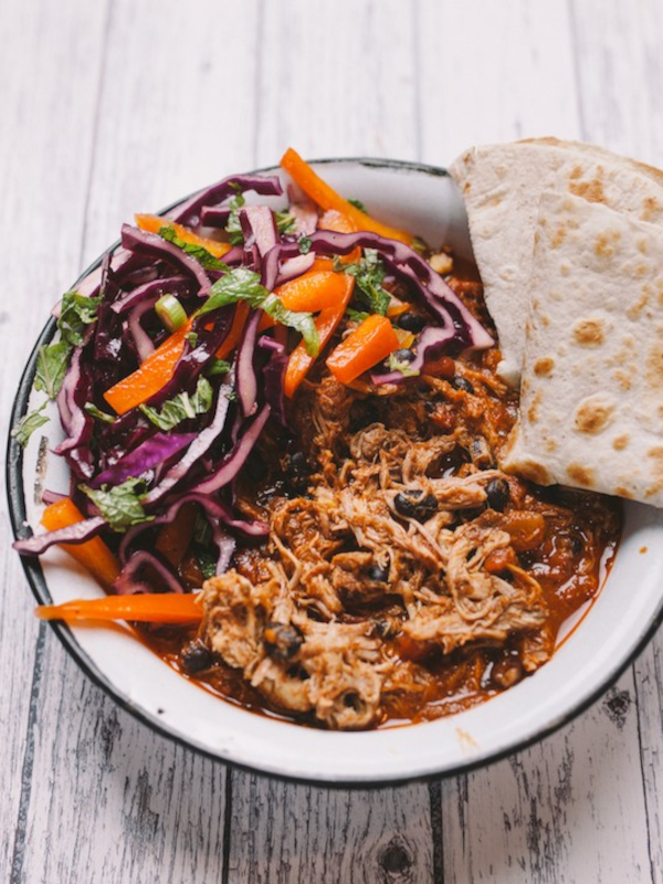 Harissa pulled pork & black bean chilli with crunchy red cabbage salad
